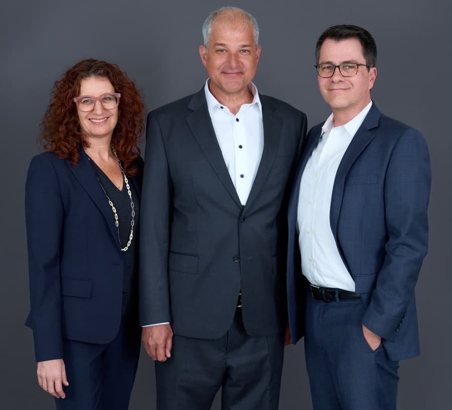 Founding partners Elisa Paster, Dave Rand, and Todd Nelson